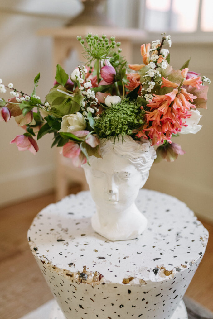 Hyacinth, hellebore, spirea spring flower arrangement